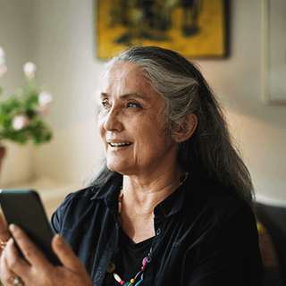 Women_with_mobile_460x460px.png